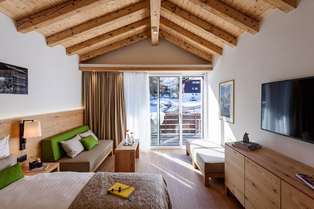 TV a/nebo společenská místnost v ubytování EVA Serviced Apartments