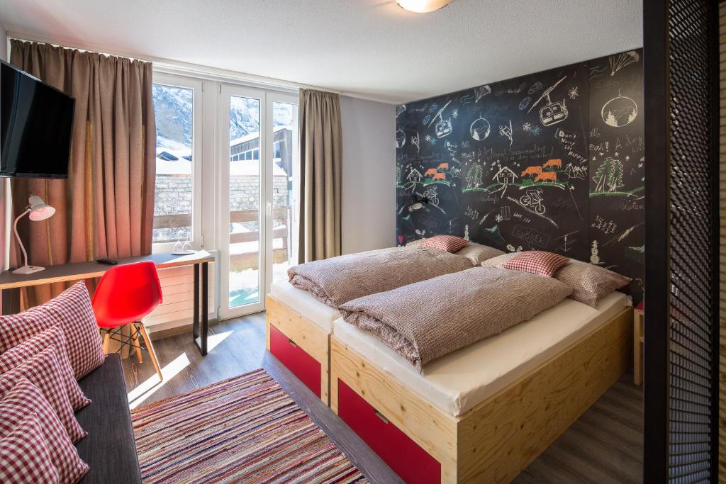 Letto o letti in una camera di Eiger Guesthouse