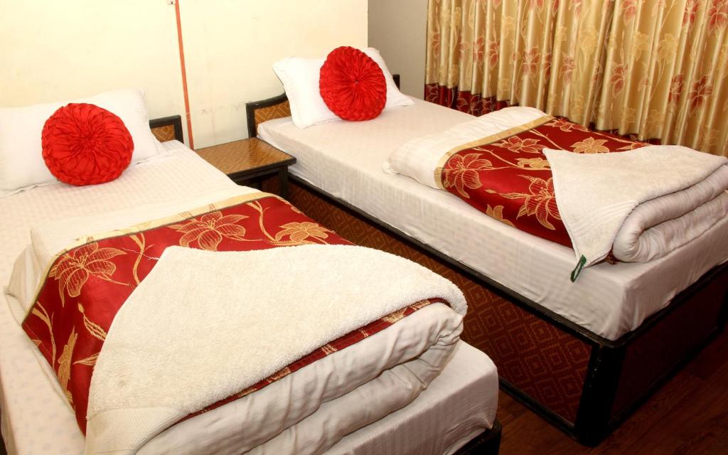 Postel nebo postele na pokoji v ubytování Elbrus Home