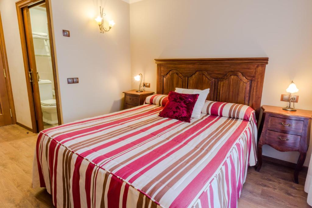 Postel nebo postele na pokoji v ubytování Hotel Flor De Neu