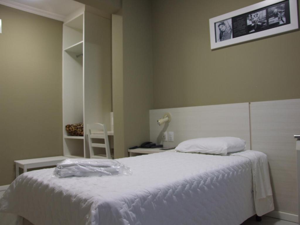 Postel nebo postele na pokoji v ubytování Hotel Emacite Flex