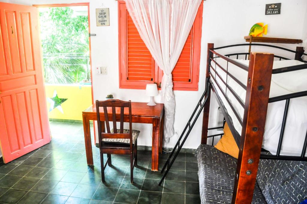 Postel nebo postele na pokoji v ubytování Casa Delfin Guest House