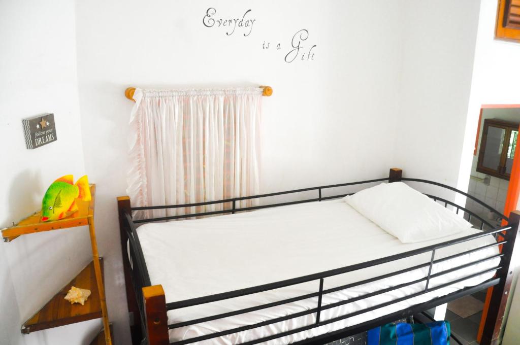 Postel nebo postele na pokoji v ubytování Casa Delfin Guest House