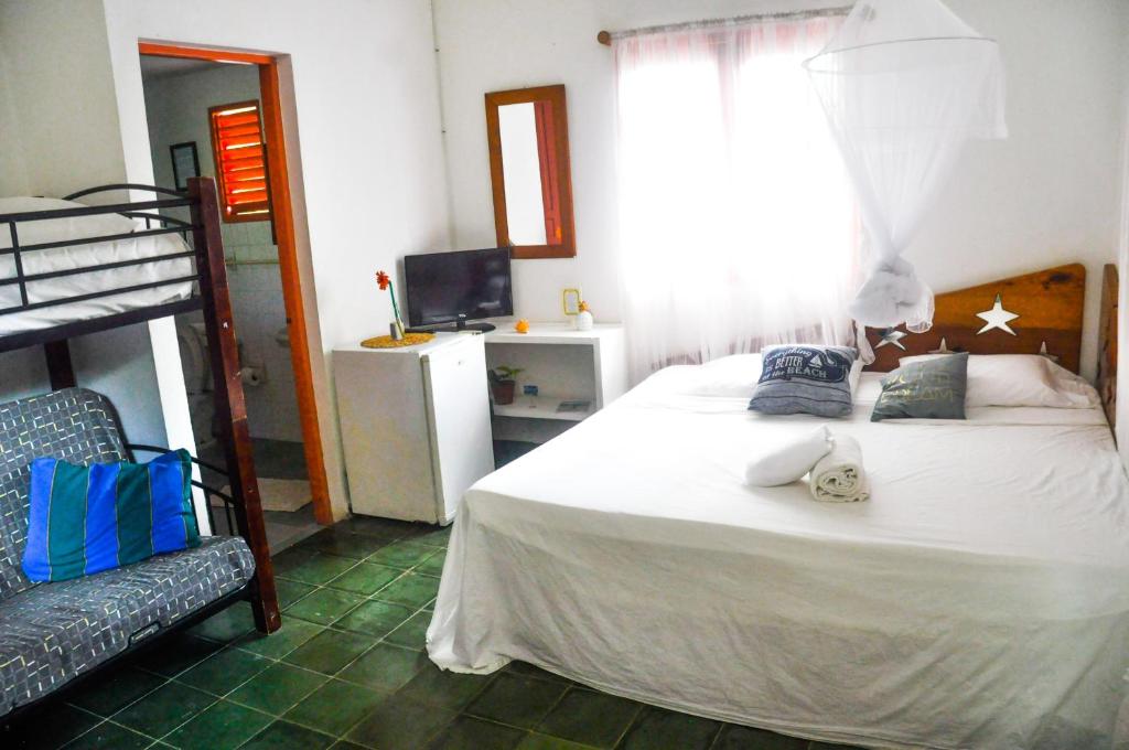 Postel nebo postele na pokoji v ubytování Casa Delfin Guest House