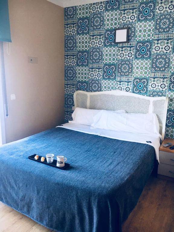 Postel nebo postele na pokoji v ubytování Hotel 139