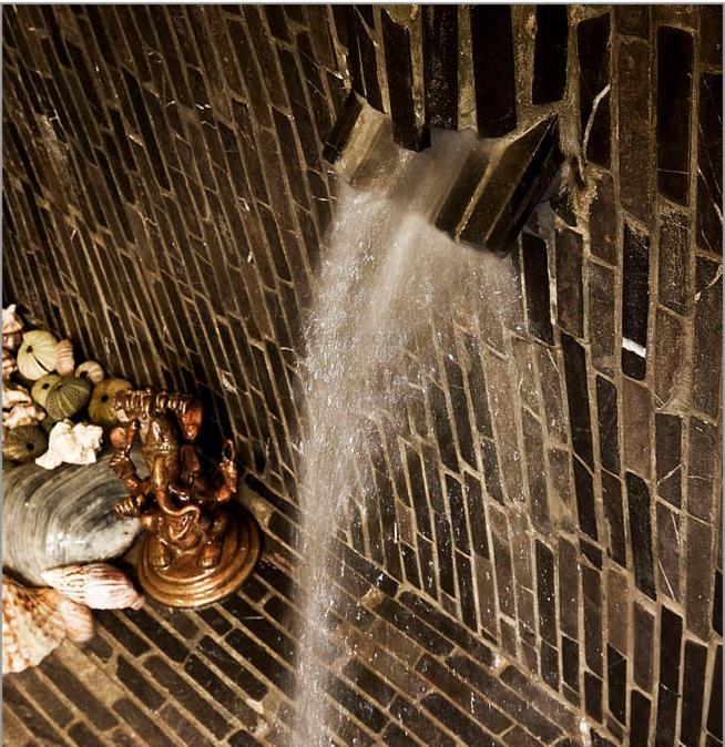 a close up of a water fountain on a street at Apartamento Loft en Tarifa in Tarifa