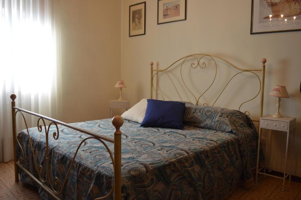 Posteľ alebo postele v izbe v ubytovaní Casa Iliana