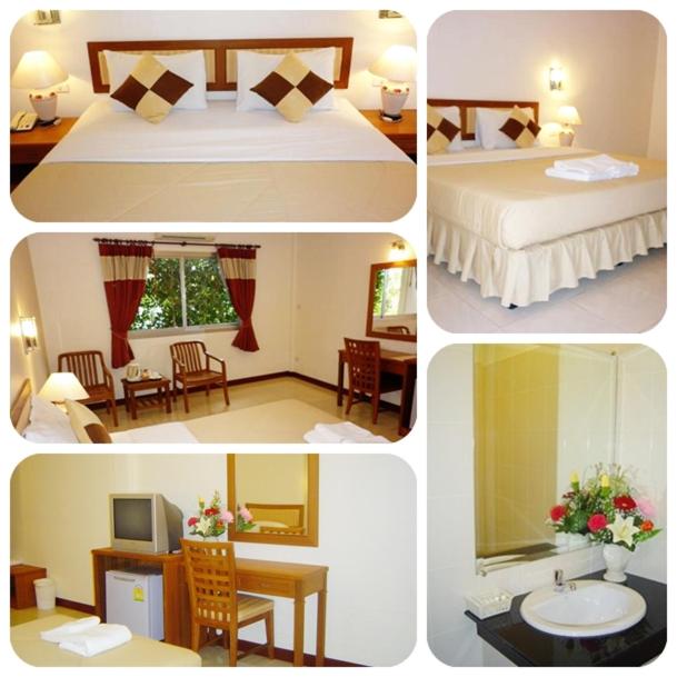 Postel nebo postele na pokoji v ubytování Prachuap Place Hotel