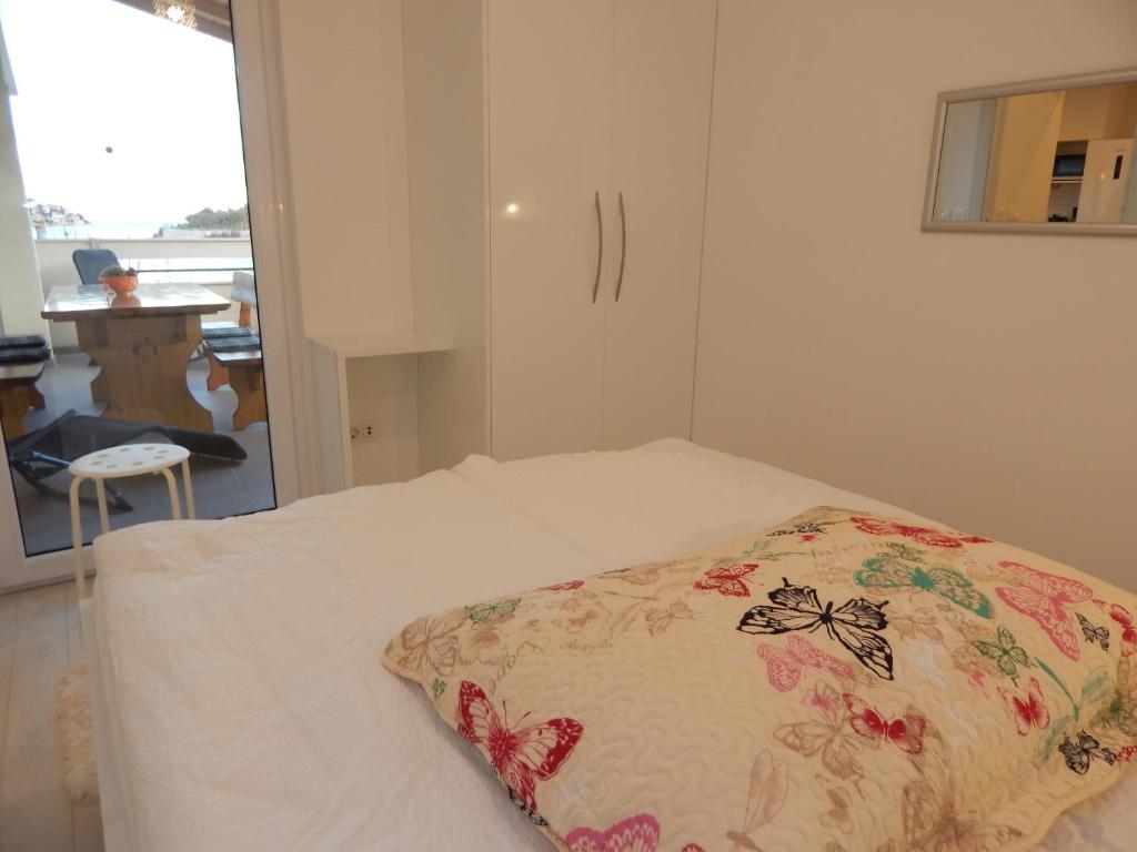 Postel nebo postele na pokoji v ubytování Apartment Pika 2