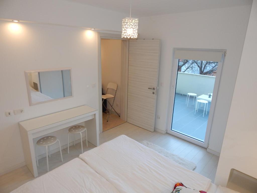 Postel nebo postele na pokoji v ubytování Apartment Pika 2