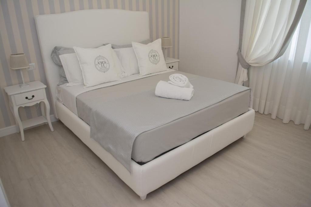 Łóżko lub łóżka w pokoju w obiekcie B&B Pompei Passion