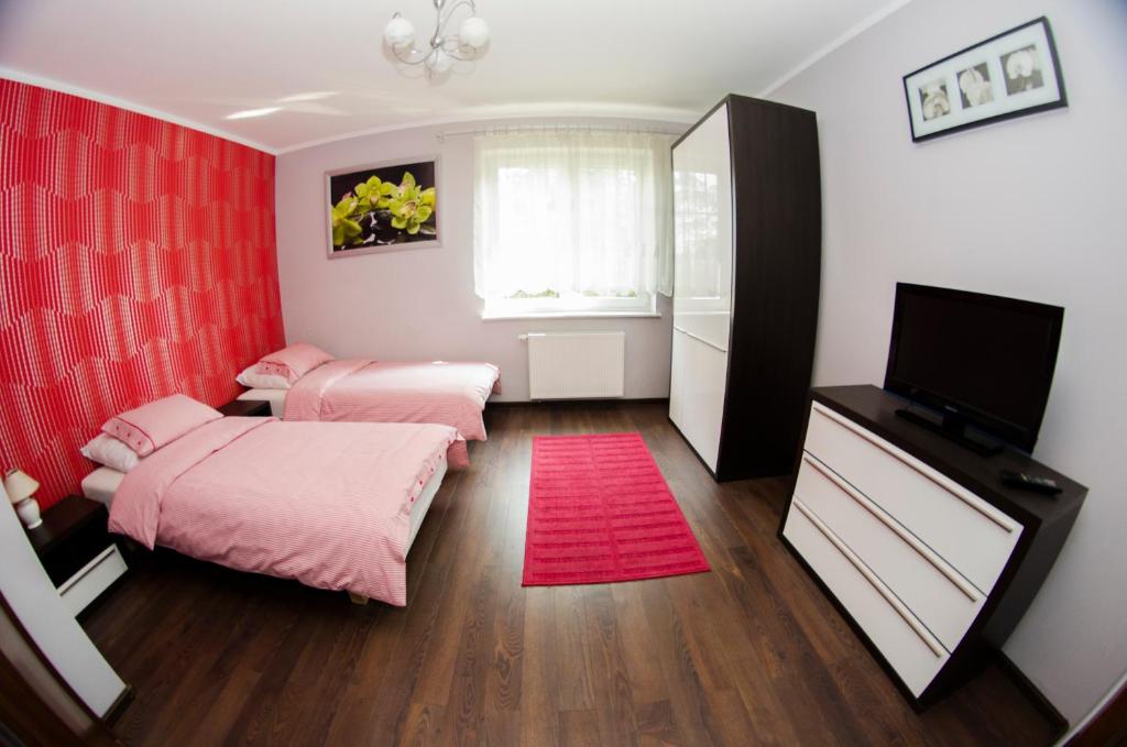 Posteľ alebo postele v izbe v ubytovaní Villa Hof