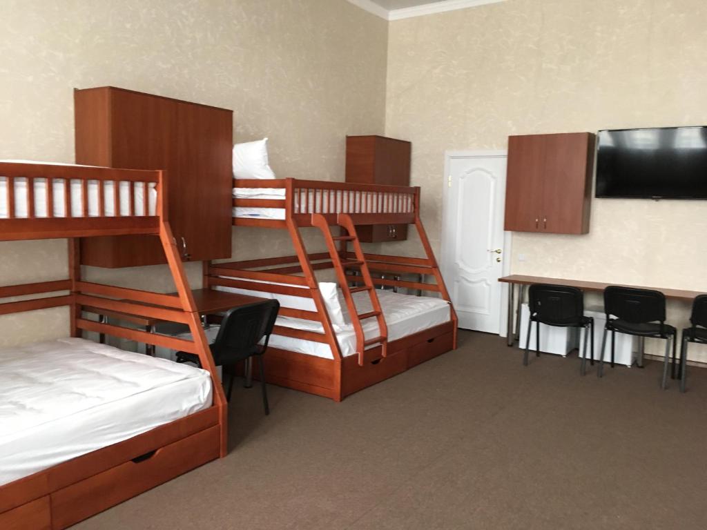 Postel nebo postele na pokoji v ubytování Отель БЕССАРАБИЯ