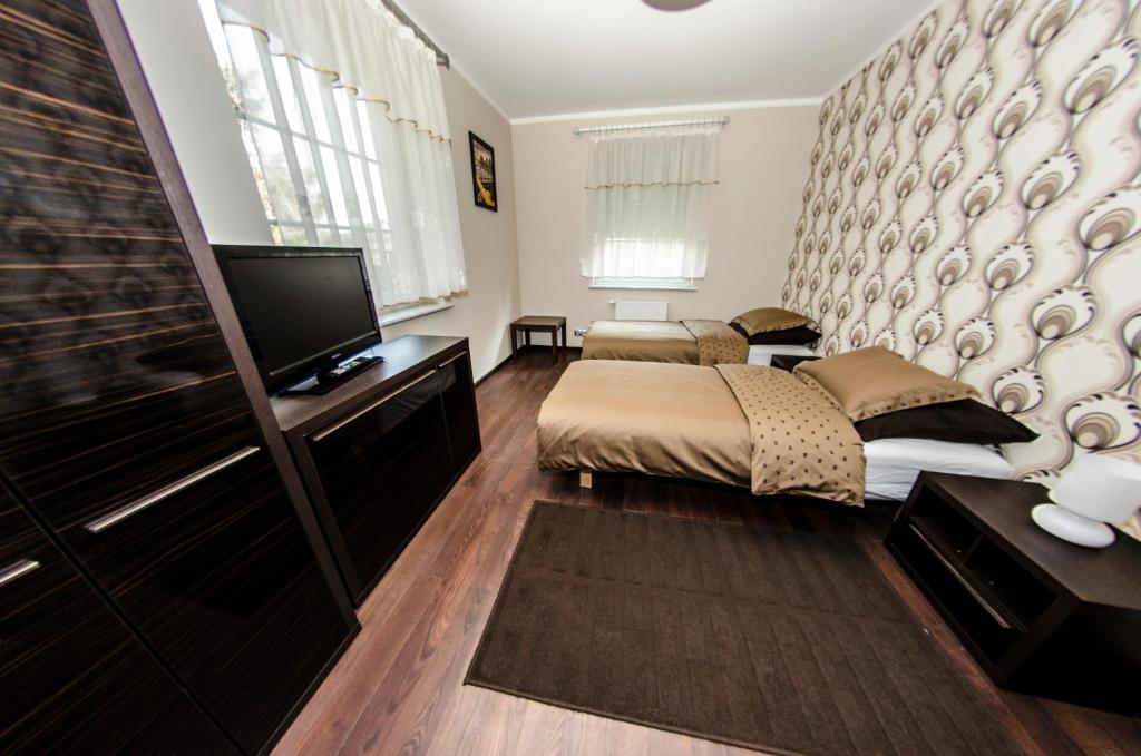 Posteľ alebo postele v izbe v ubytovaní Villa Hof