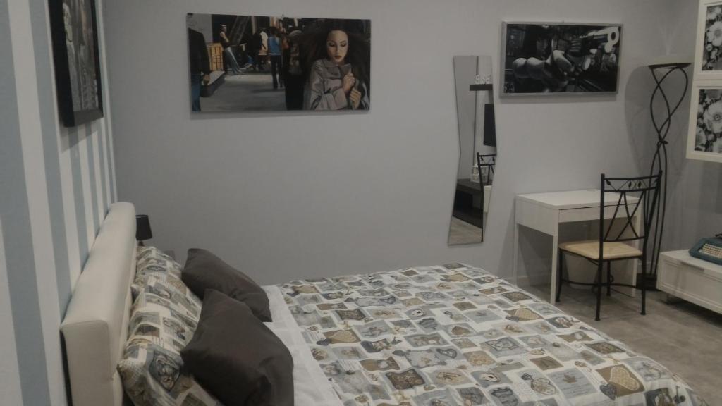 A bed or beds in a room at B&B A casa dell'artista