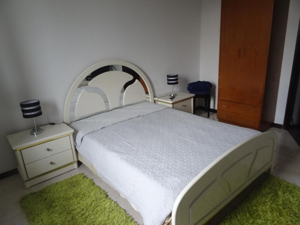 Postel nebo postele na pokoji v ubytování Casa Teresinha