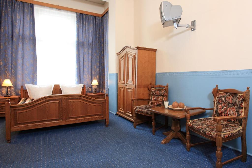 Posezení v ubytování Hotel-Pension Cortina