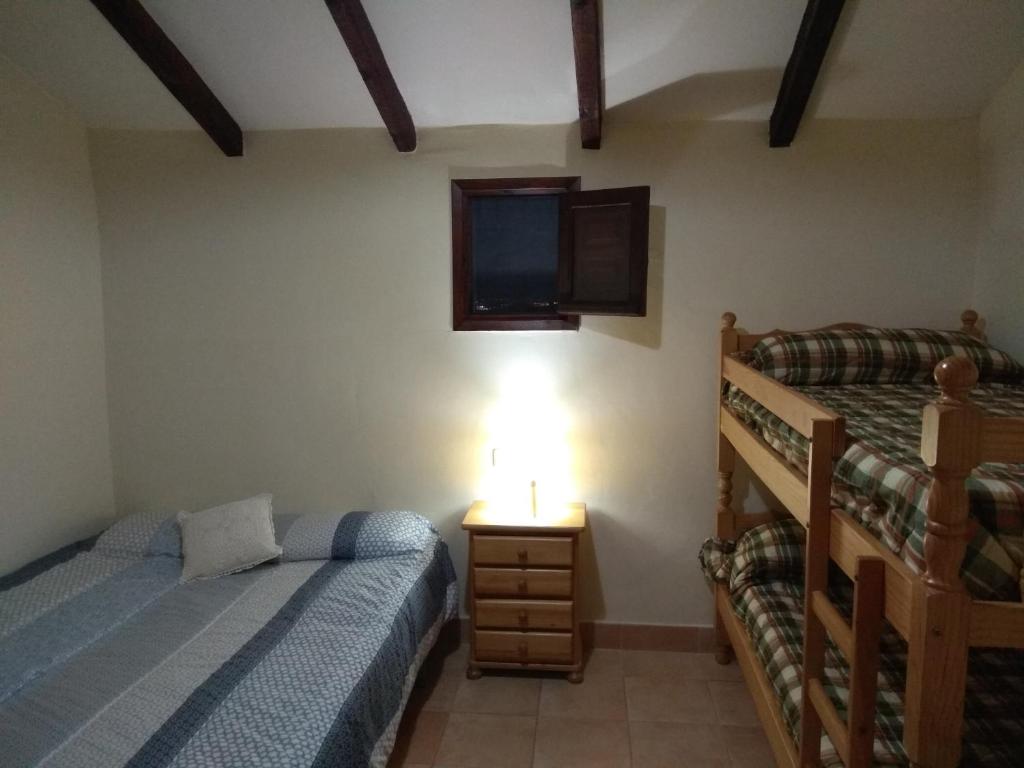 Postel nebo postele na pokoji v ubytování Finca El Carrascal