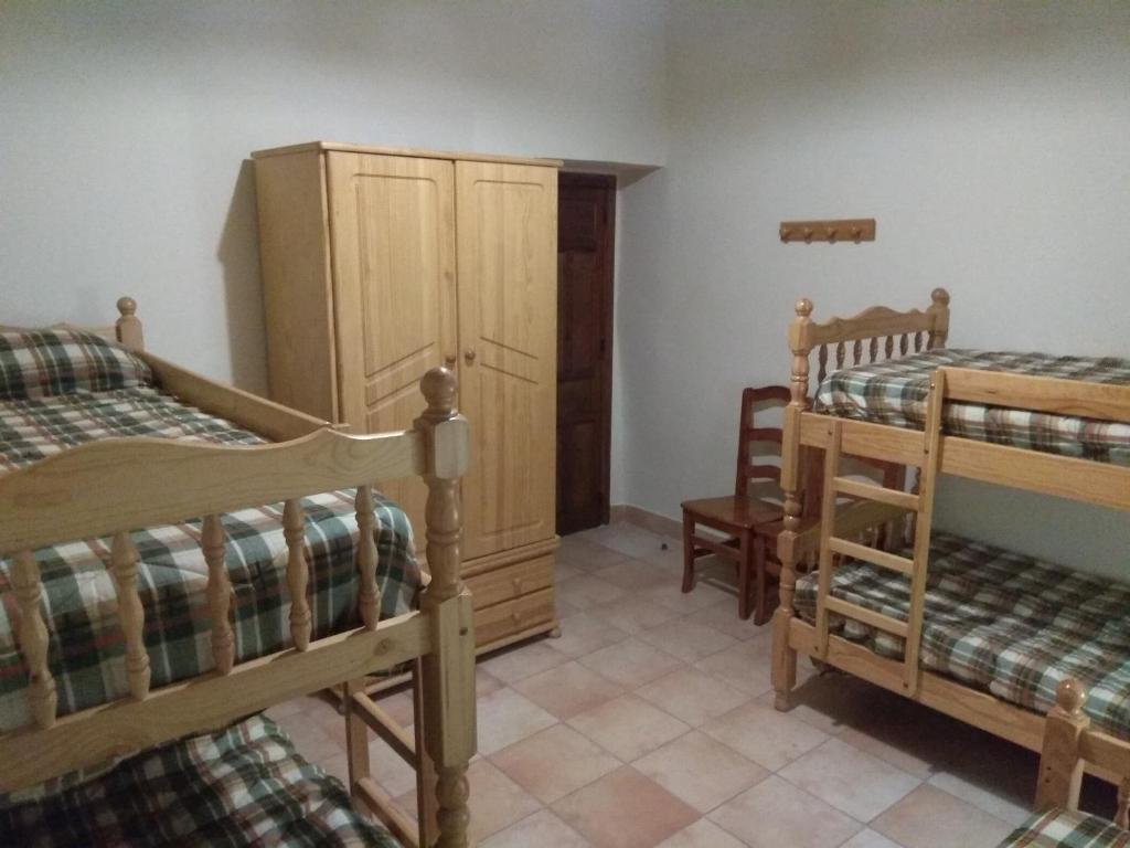 Postel nebo postele na pokoji v ubytování Finca El Carrascal