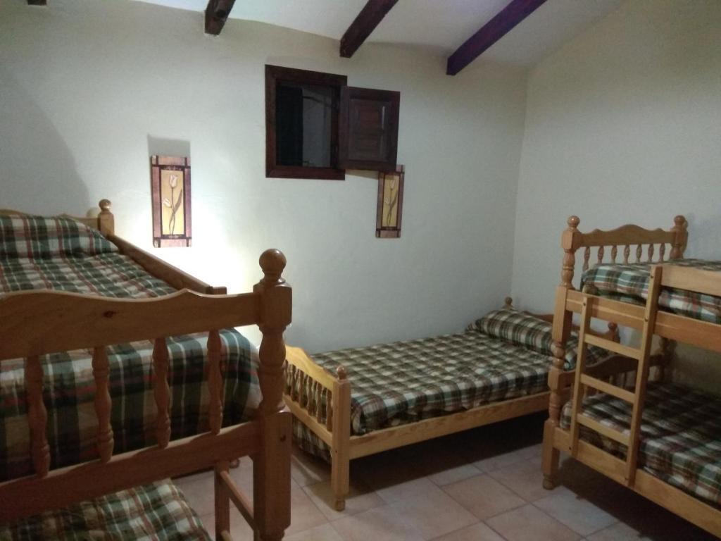 Postel nebo postele na pokoji v ubytování Finca El Carrascal