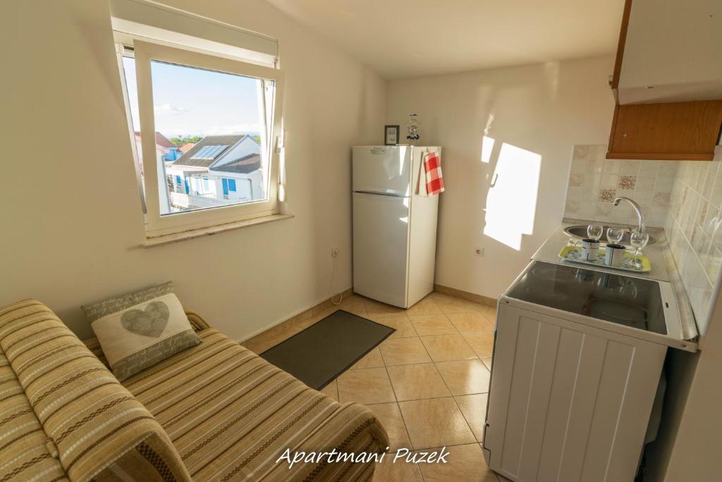 Kuchyň nebo kuchyňský kout v ubytování apartmani Puzek