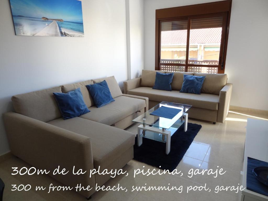 A seating area at Apartament Lazurowy