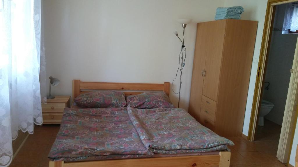 Postel nebo postele na pokoji v ubytování Autocamp Skalice
