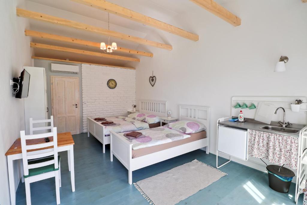 Postel nebo postele na pokoji v ubytování La Bobul Apartments