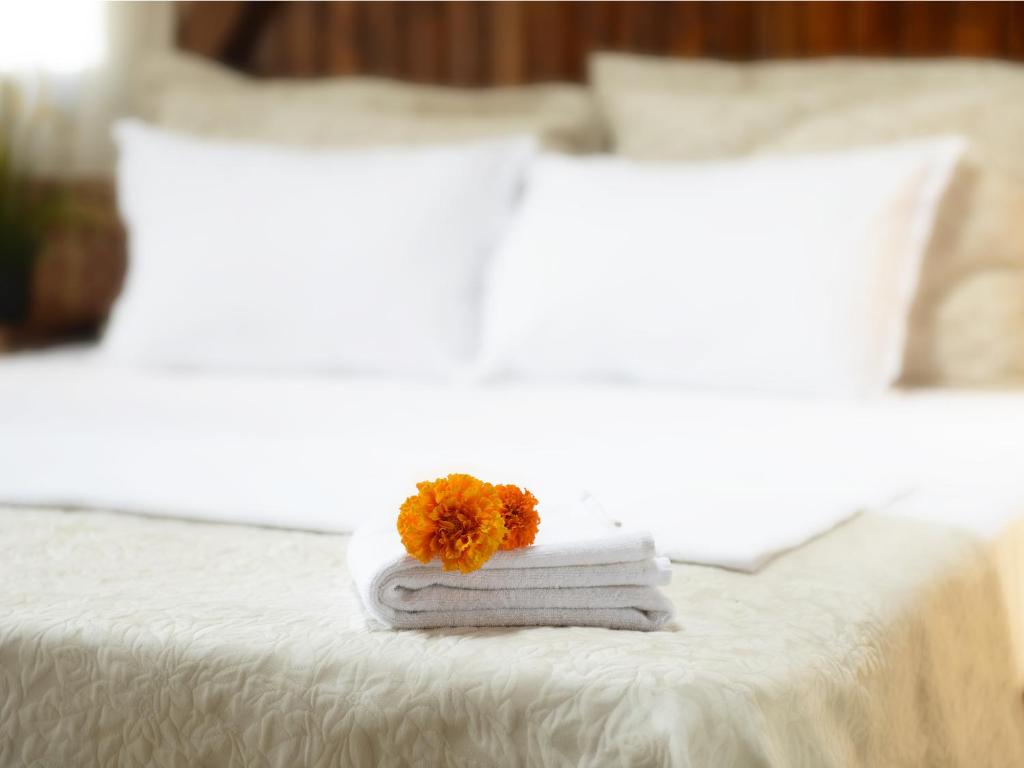 Postel nebo postele na pokoji v ubytování Hotel Schwarzes Ross Siebenlehn