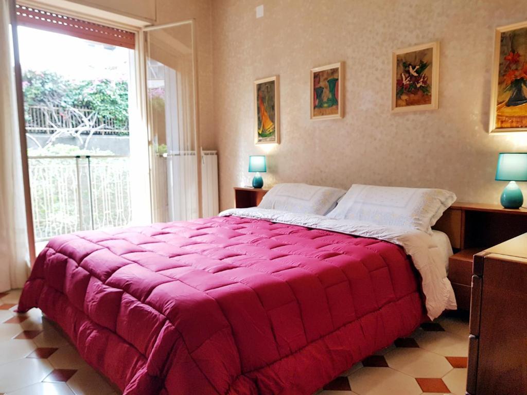 Postel nebo postele na pokoji v ubytování Catania house Apartment