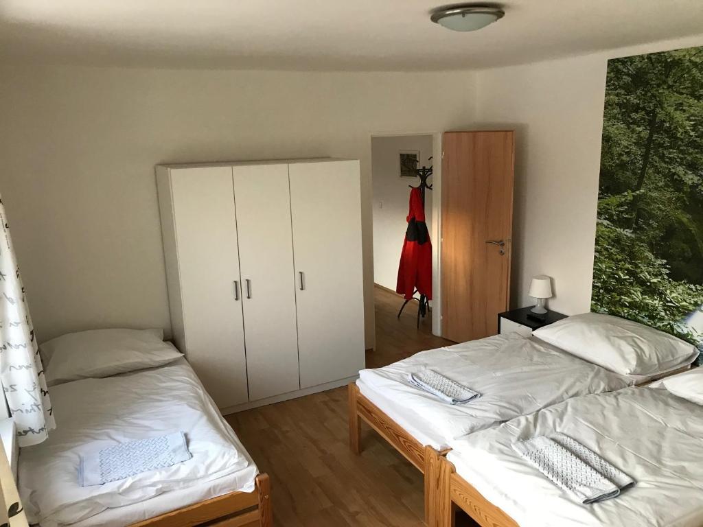 Postel nebo postele na pokoji v ubytování Apartmány Viktorka