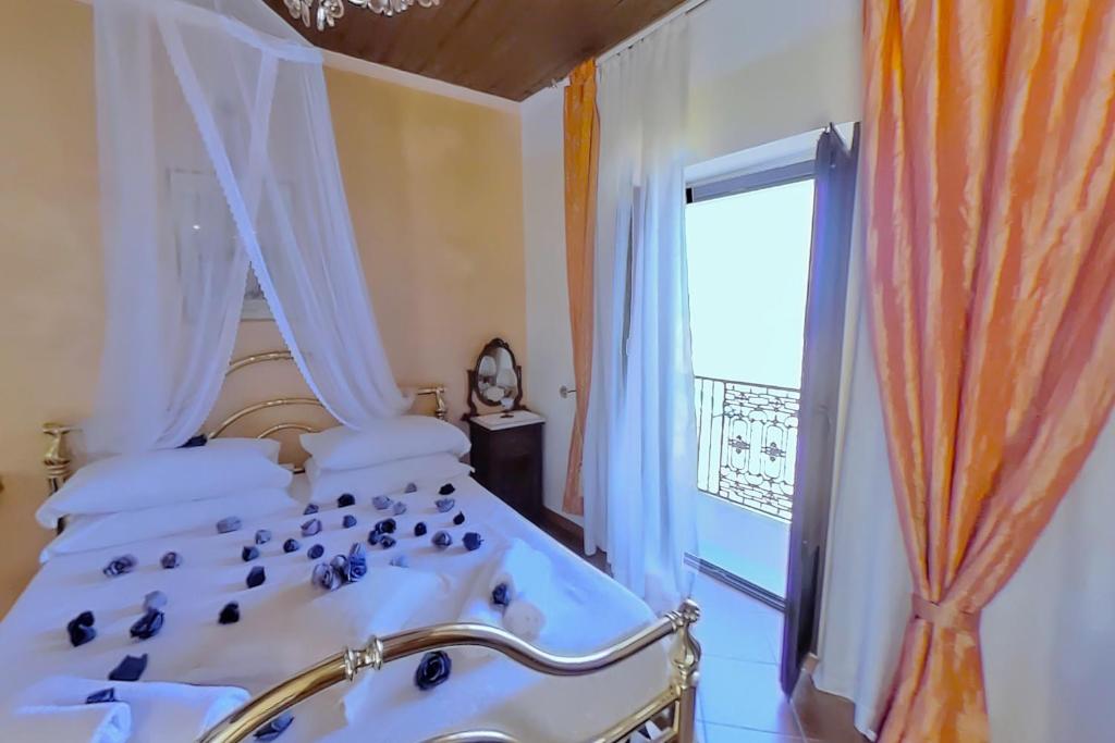 Postel nebo postele na pokoji v ubytování Casa Angelieri