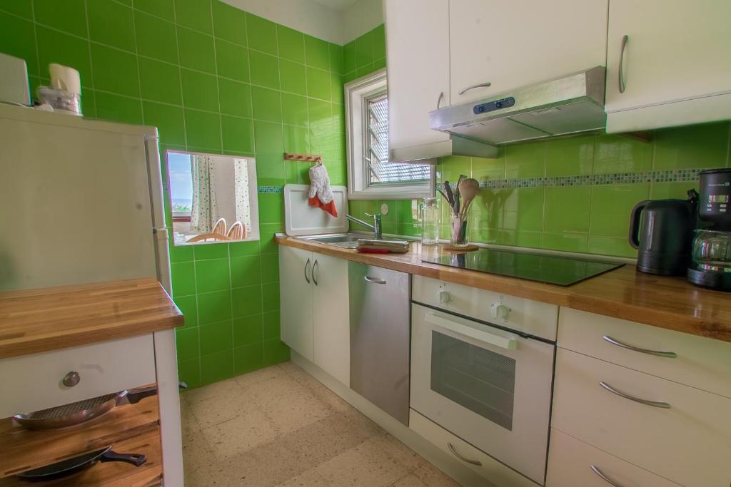 Kuchyň nebo kuchyňský kout v ubytování Apartments Finca El Rincón