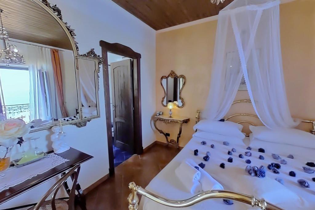 Postel nebo postele na pokoji v ubytování Casa Angelieri