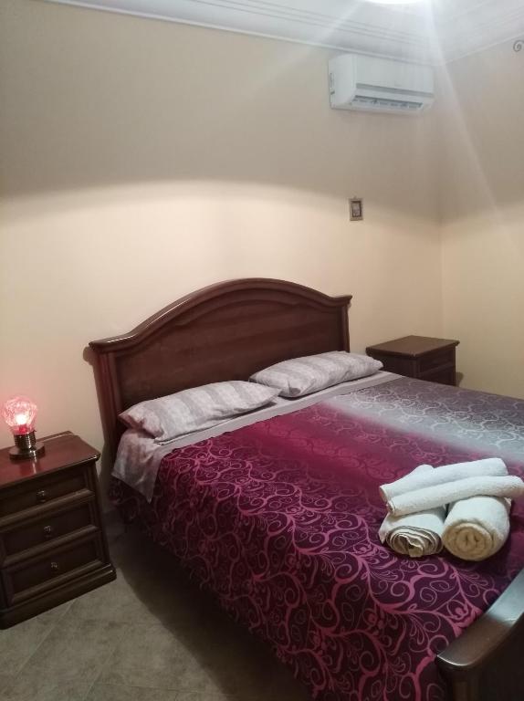 Кровать или кровати в номере Villa con piscina uso esclusivo