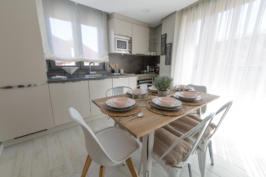 Kuchyň nebo kuchyňský kout v ubytování Apartamentos Inloft