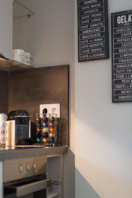 Kuchyň nebo kuchyňský kout v ubytování Apartamentos Inloft