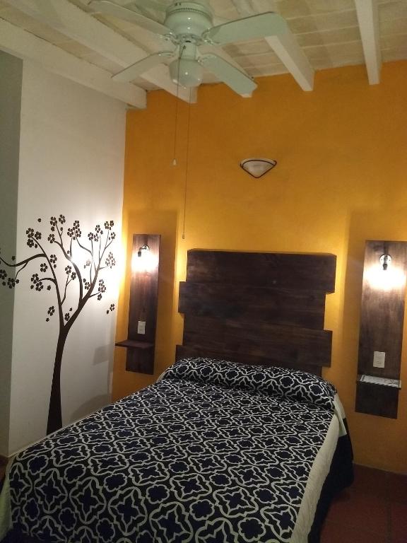 Letto o letti in una camera di Posada Casa Topiltzin