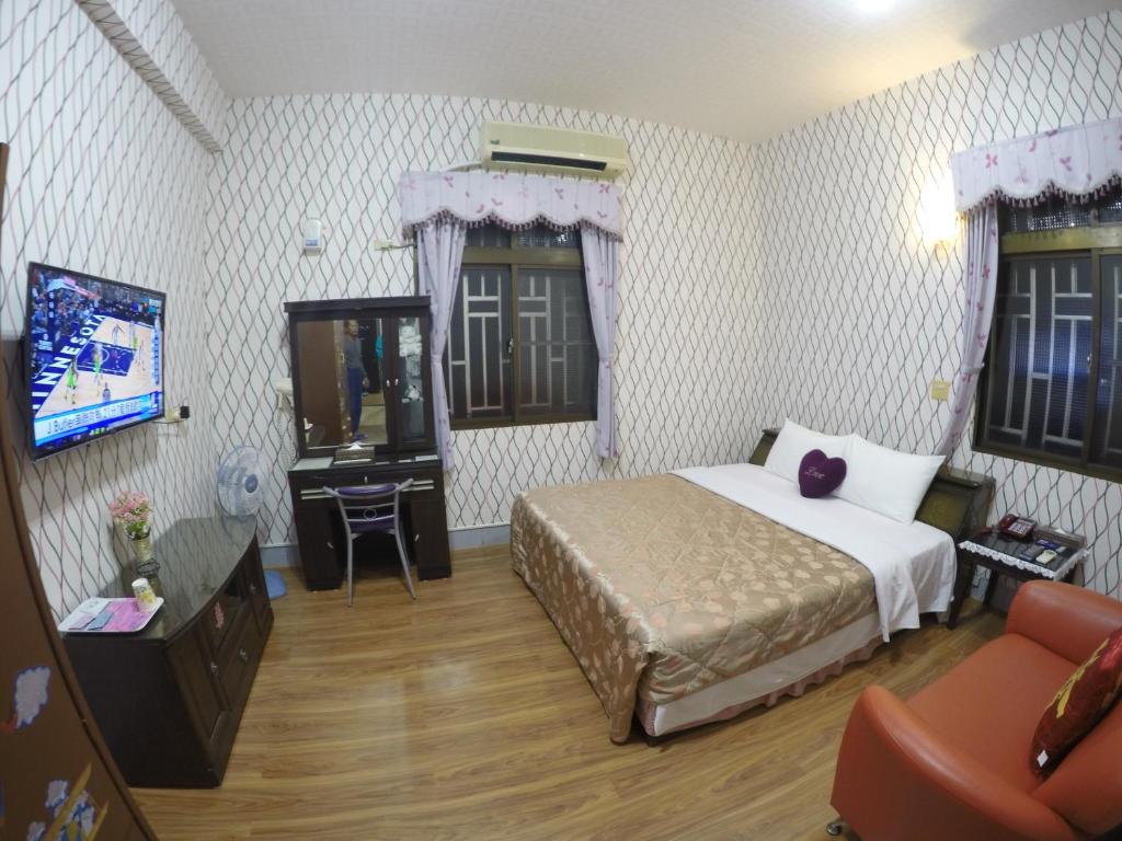 Postel nebo postele na pokoji v ubytování Reny Lake Warm Hostel
