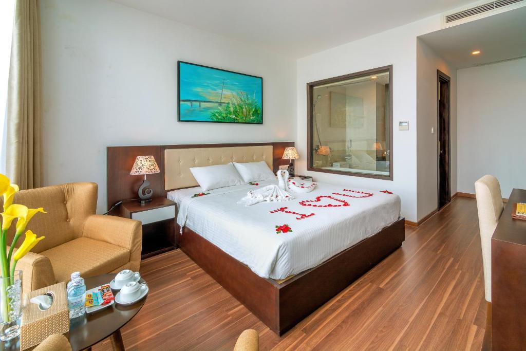 Postel nebo postele na pokoji v ubytování Dana Marina Boutique Hotel