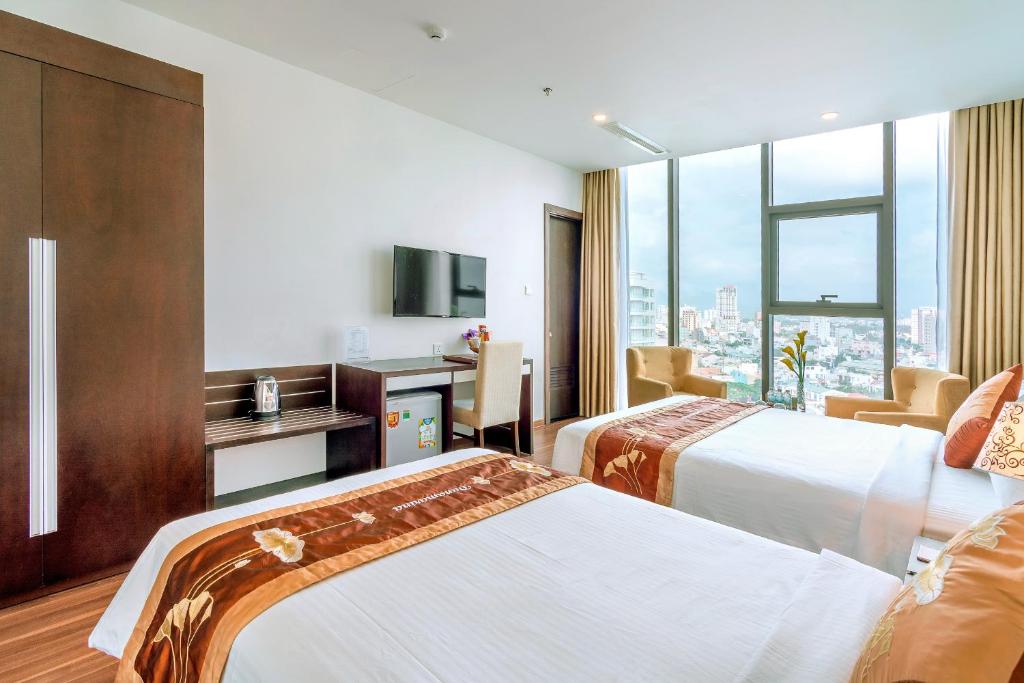 Postel nebo postele na pokoji v ubytování Dana Marina Boutique Hotel