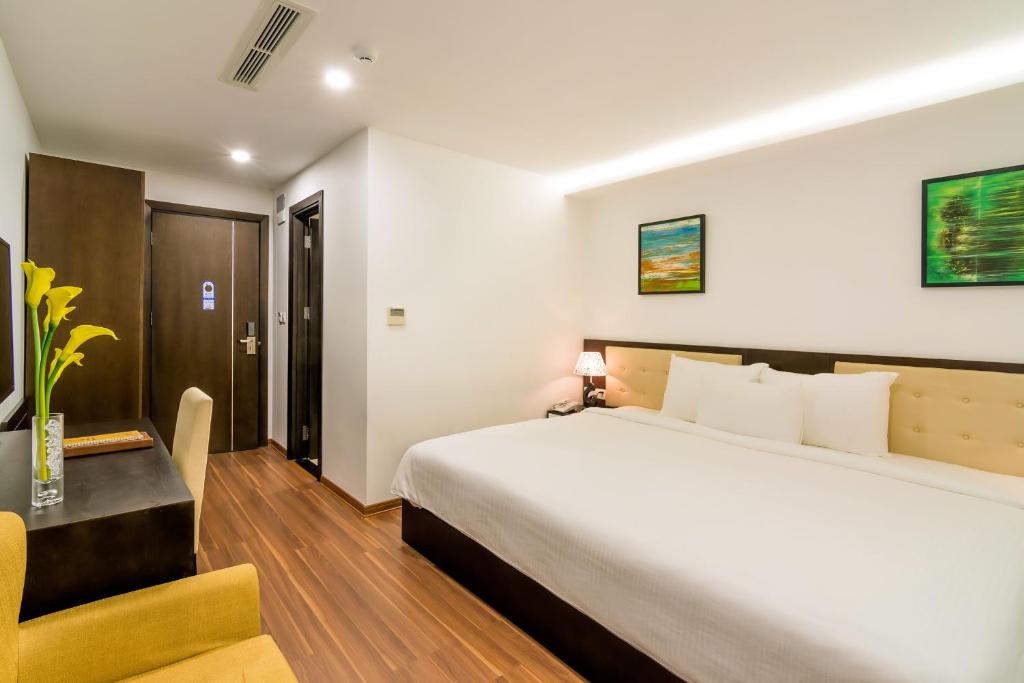 Postel nebo postele na pokoji v ubytování Dana Marina Boutique Hotel