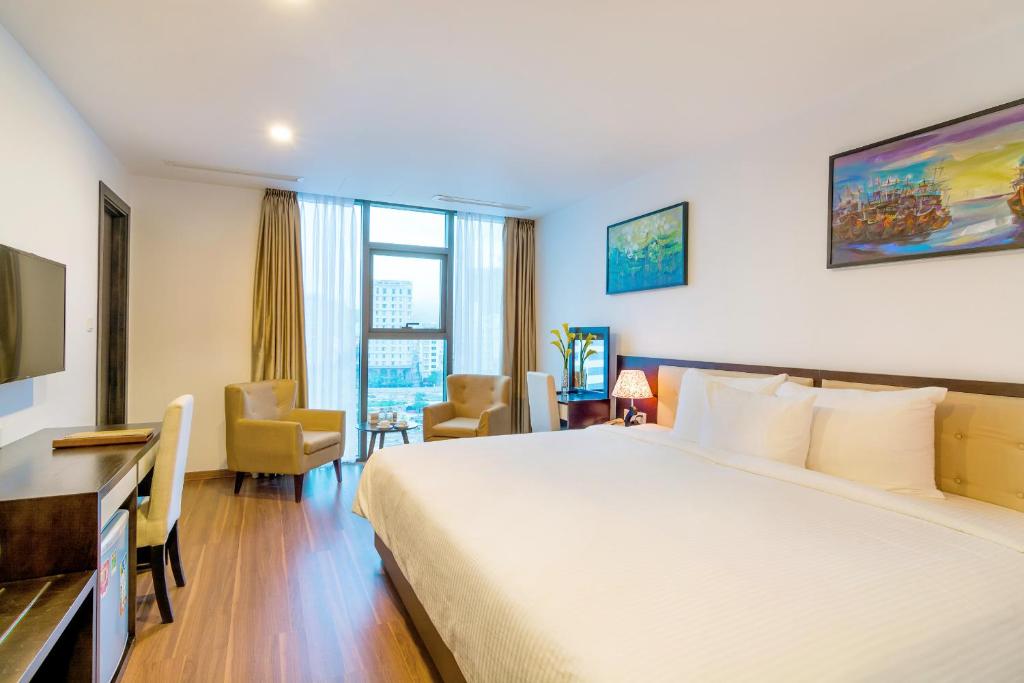 Postel nebo postele na pokoji v ubytování Dana Marina Boutique Hotel