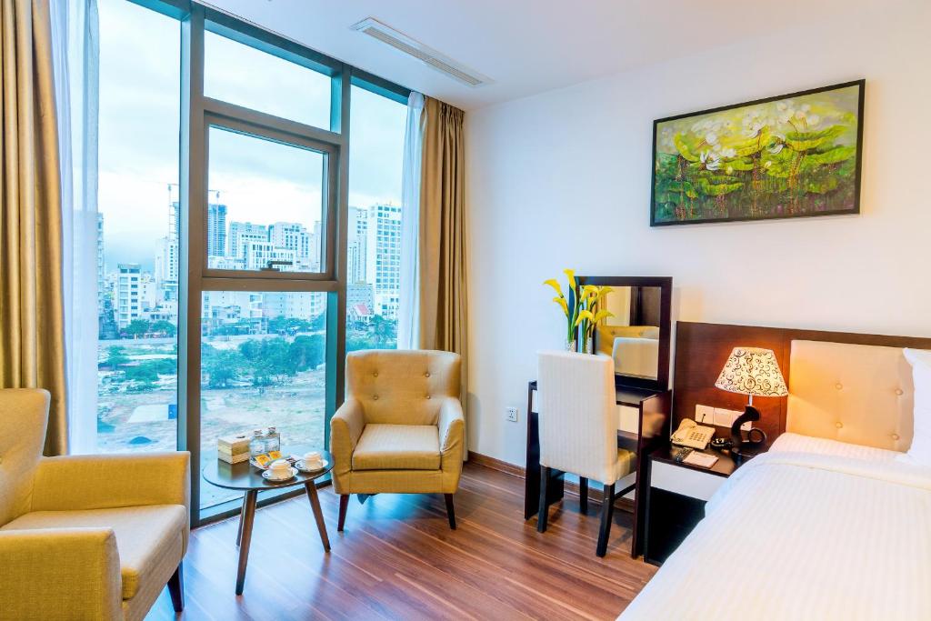 Postel nebo postele na pokoji v ubytování Dana Marina Boutique Hotel