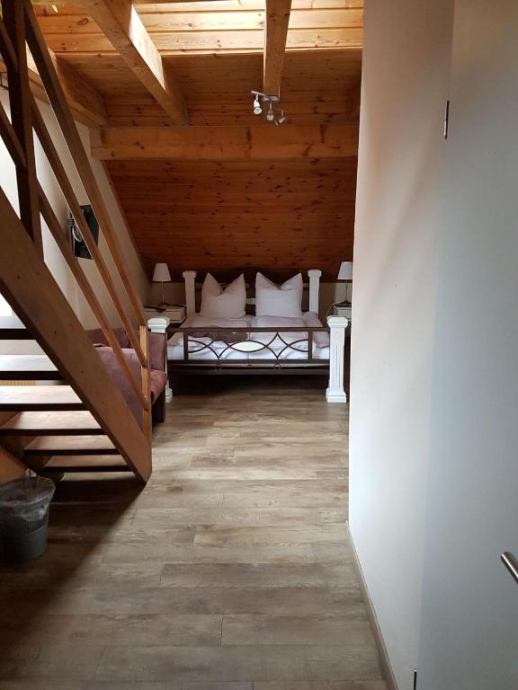 Postel nebo postele na pokoji v ubytování Zur Schanze Holtgast-Apen