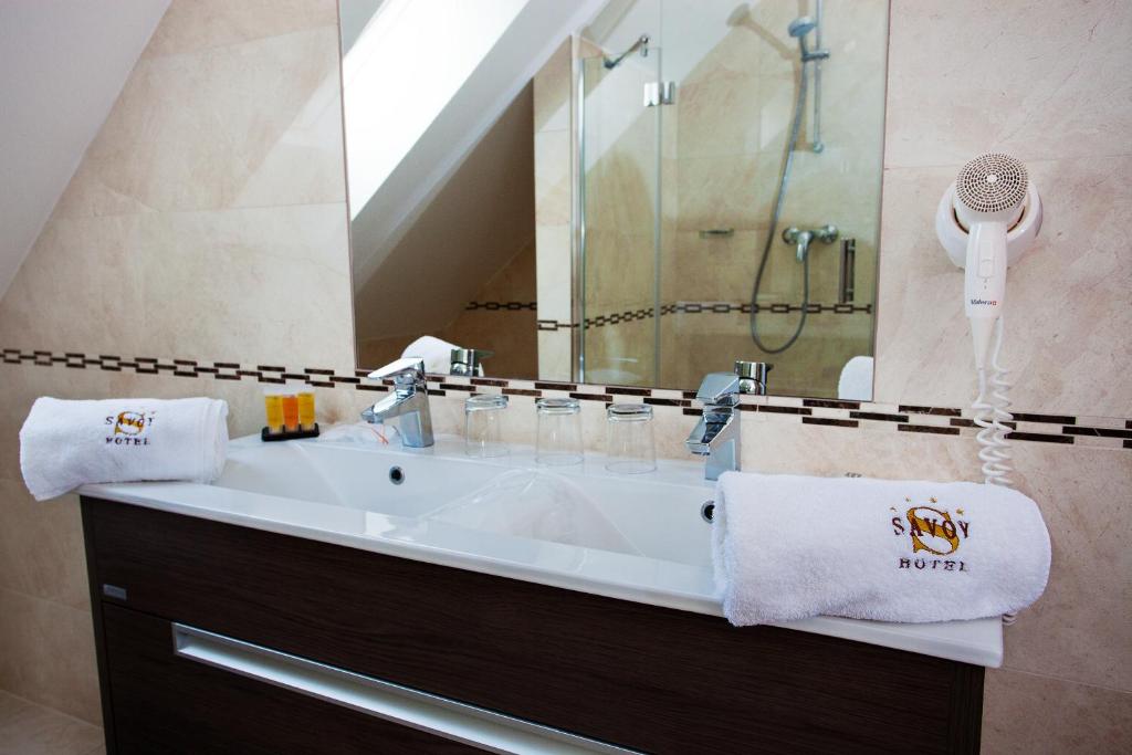 Koupelna v ubytování Hotel Savoy