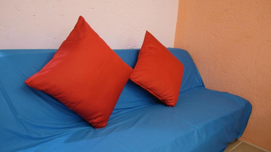 Postel nebo postele na pokoji v ubytování 小島旅店Island Inn