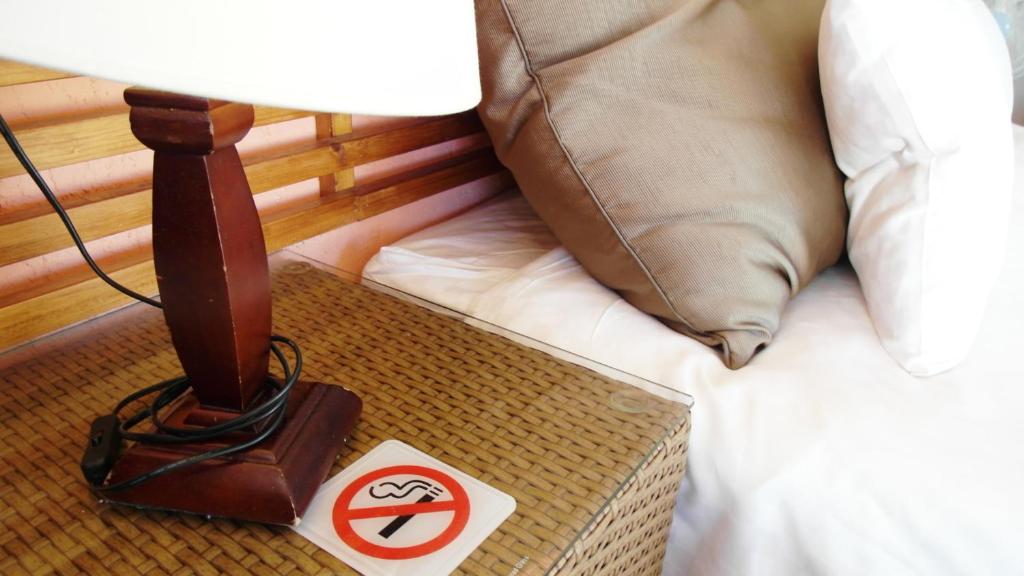 Postel nebo postele na pokoji v ubytování 小島旅店Island Inn