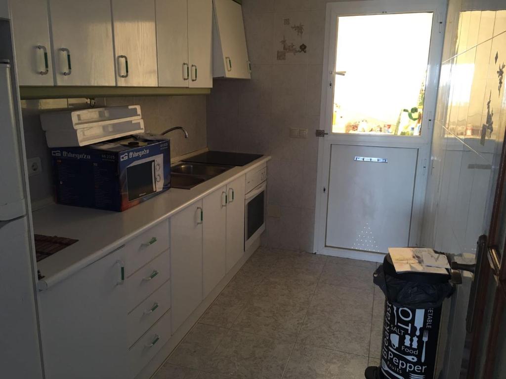 A kitchen or kitchenette at Casa playa el Torreon