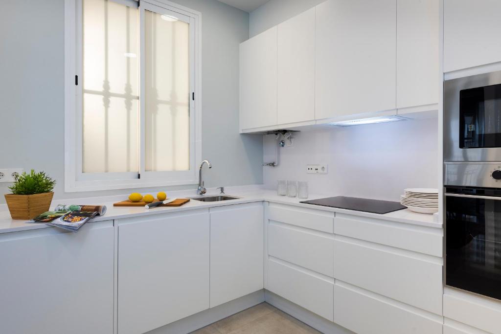 Kuchyňa alebo kuchynka v ubytovaní Genteel Home Santa Marta